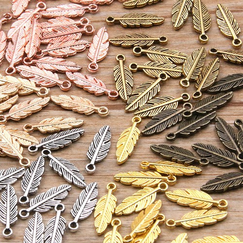 Feather charms metal - 20,