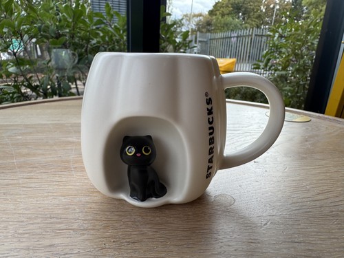 Starbucks peep black cat - starbucks,