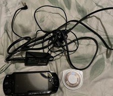 Sony PSP Entertainment 1003 Console With Original Charger & Monster Hunter Game