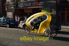 Photo 6x4 Eco Taxi -