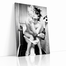 WOMEN SITTING ON TOILET