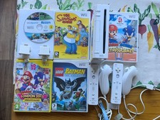 nintendo wii console bundle with the simpsons and Wii sports +Wii Resorts + more