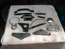 TRIUMPH T140 JOB LOT FRAME BRACKETS/ PARTS.CLOCK MOUNT, POINTS COVER ETC