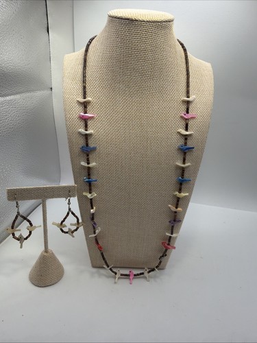 Heishi beaded hand - hand, carved