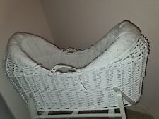 Mamas & Papas moses basket with a rocking stand and a mattress