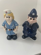 A Pair Of Vintage Woolworths Figurines, Smiling Policeman And NHS Nurse