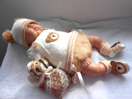 Hand knitted cream teddy - hand,