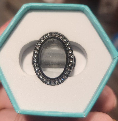 Black living locket ring with - locket,