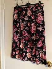 skirt size 14 by Bon Marche floral pattern, zip fastening , midi length 