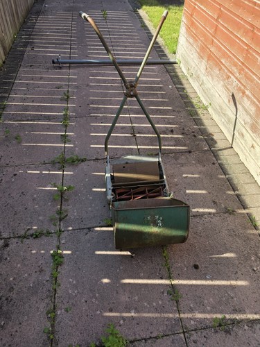 Vintage hand push lawnmower - hand,