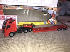 Joal Corgi 1.50 Scale Code 3 Volvo FH16 Globetrotter + Low Loader CAT  RED