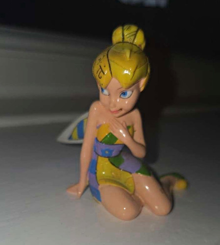 Disney tinker bell sitting - disney,