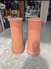 Two Red Terracotta Pair Of
