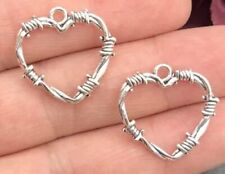 Small barbed wire heart charms 4 pack.