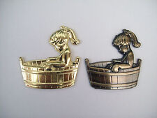 METAL GIRL IN TUB BATHROOM