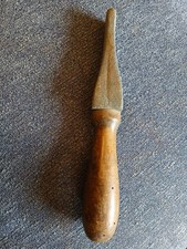 VINTAGE HANDLED CARBORUNDUM