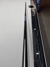 American pool cue , predator