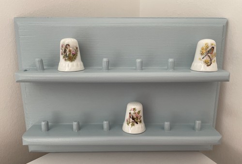 Thimble holder wall - holder,