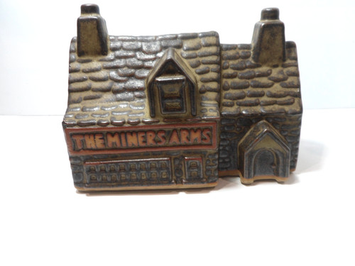 Tremar pottery the miners - pottery, arms