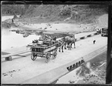 Horse drawn wagon and a motor