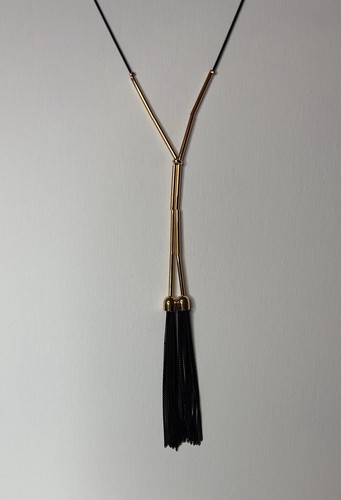 Gold tone black twin - tone,