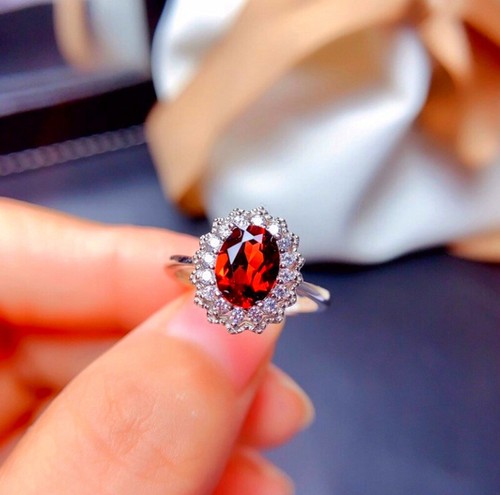 Oval cut zircon - cluster, ring