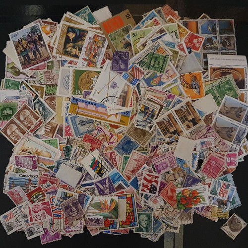 1000 world stamps off paper - stamps,