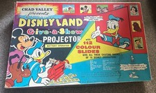 Vintage Chad Valley Disneyland give-a-show projector in original box .