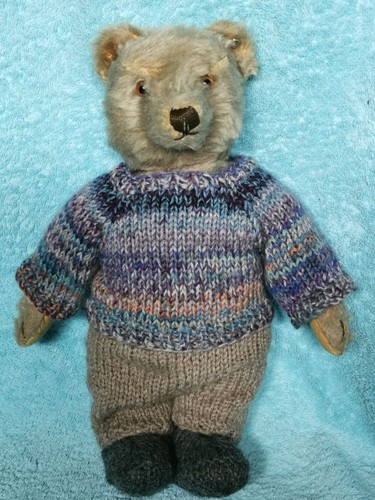 Hand knitted teddy bear