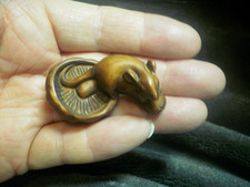 Hand Carved wood netsuke of a