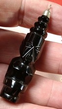 Tiki god statue black stone - god,