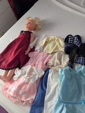 Doll With Clothes Bundle