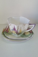 Art Deco Shelley Queen Anne Trio Tea Cup Saucer Plate Mauve Garden Urn 11617
