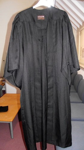 Graduation attire gown and - graduation,