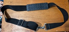 A UNUSED SHOULDER STRAP