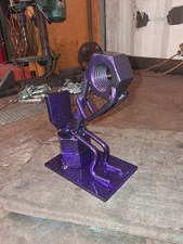 Scrap Metal Sculpture Made With Reclaimed Steel In Metallic Purple