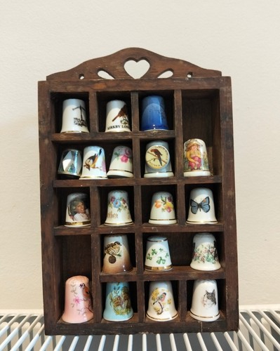 Thimble display case with - thimble,