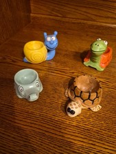 Set of four egg cups - amusing
