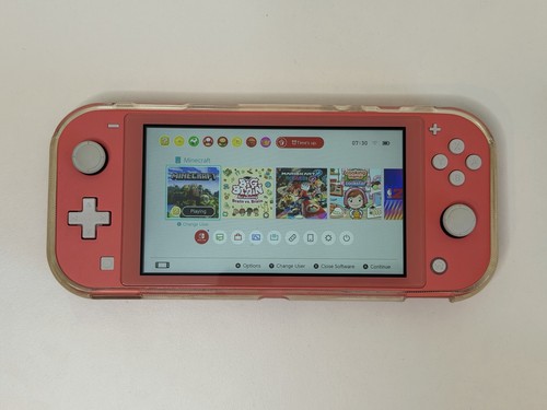 Nintendo switch lite coral - nintendo,