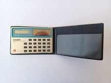 VINTAGE CASIO SL-701 SOLAR CELL ELECTRONIC CALCULATOR + CASE - TESTED & WORKING