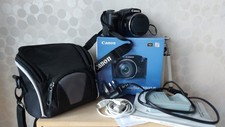 Canon PowerShot SX500 IS Digital Camera + Case and Battery Charger