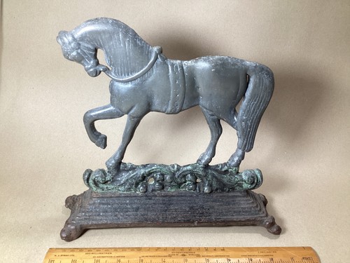 Antique door stop cast - ,