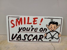 Vintage 1960's Original " SMILE YOUR ON VASCAR " Front Booster License Plate