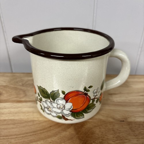 Enamel coated spouted jug - coated,