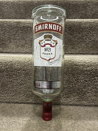 Smirnoff vodka empty - -, empty glass