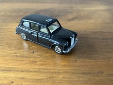 Corgi London Taxi Black Cab White Seats 1/64 Toy Model