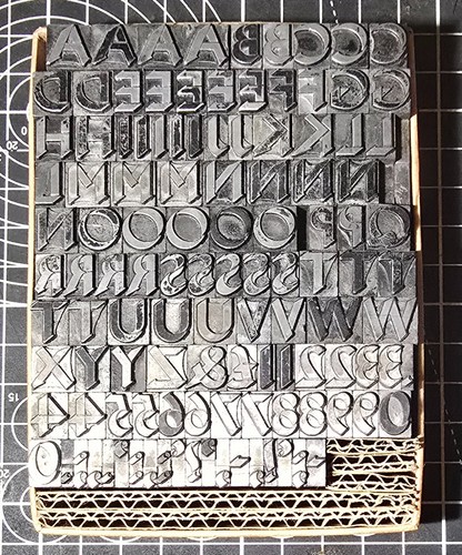 30pt gill sans caps - gill, metal