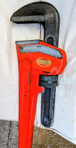 Rigid stilsons used - stilsons, in