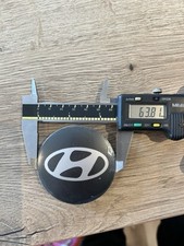 4 X GENUINE HYUNDAI ALLOY WHEEL CENTRE CAPS   