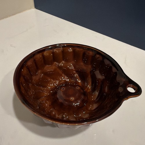 Brown glazed ceramic round - glazed,